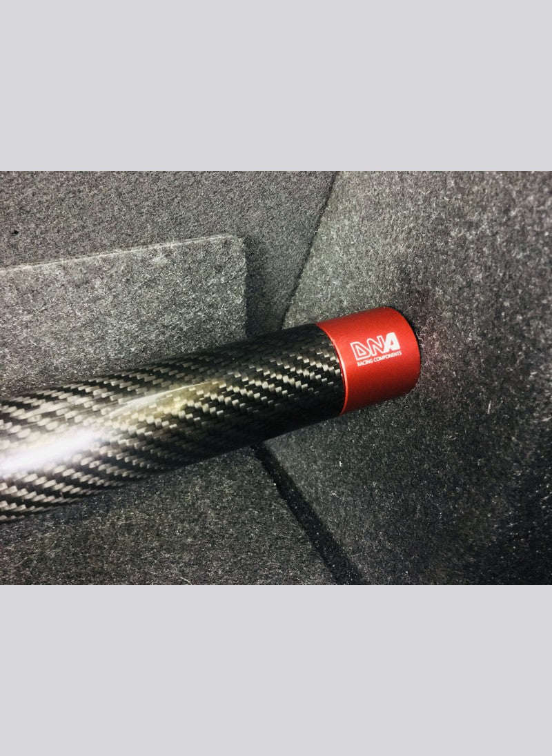 Toyota GR Yaris Carbon Fiber Rear Strut Bar- DNA Racing - TMC Motorsport